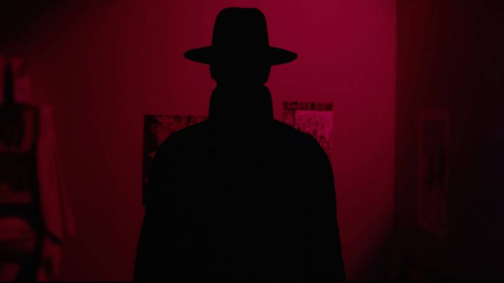 Representação do Homem do Chapéu, ou Homem da Capa Negra, ou Romano.